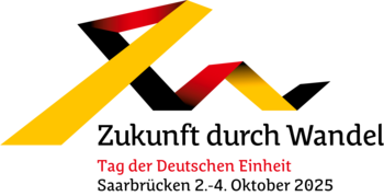 Logo für den Tag der Deutschen Einheit in Saarbrücken in Form des Saarpolygons mit dem Schriftzug "Zukunft durch Wandel"